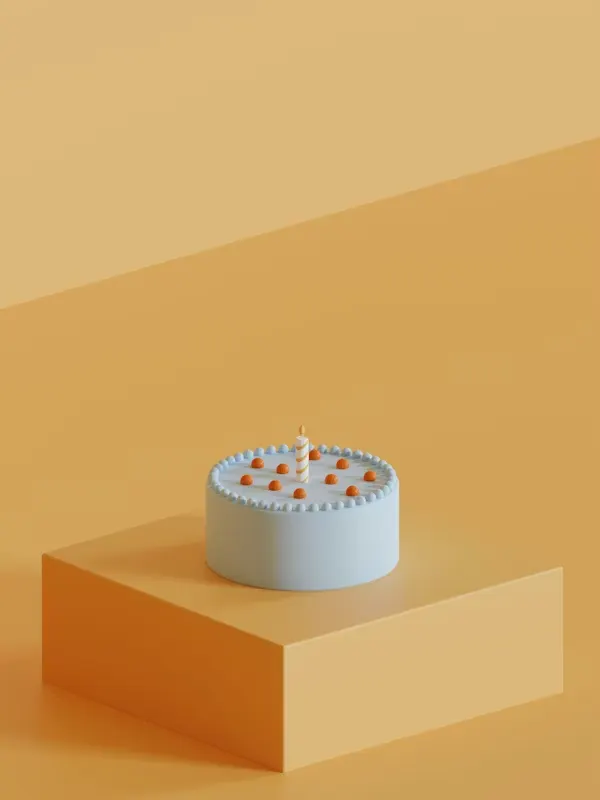 Minimalist pale blue cake with small orange dots and a single candle on a pedestal